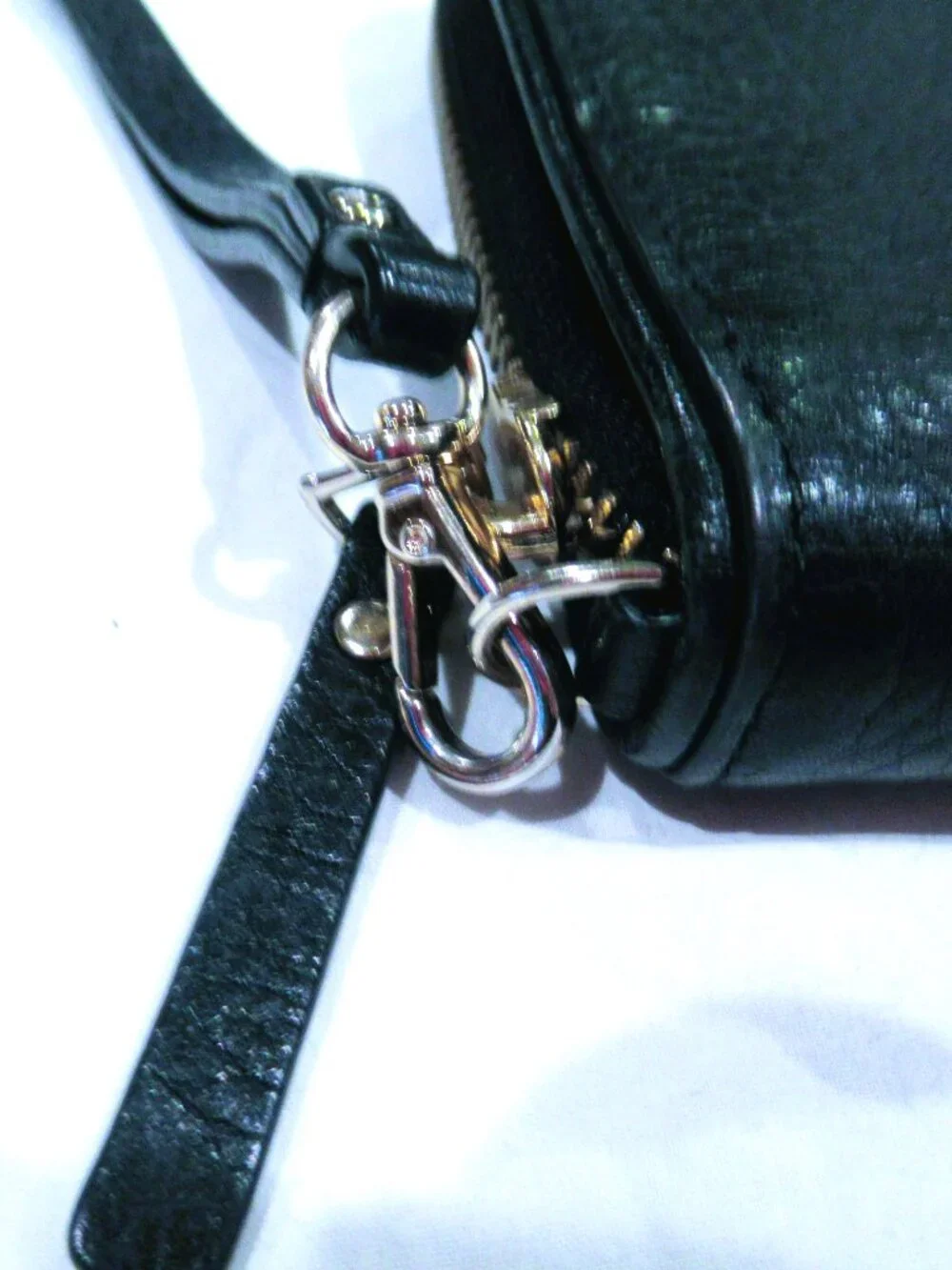 Kate Spade New York black leather wristlet / wallet